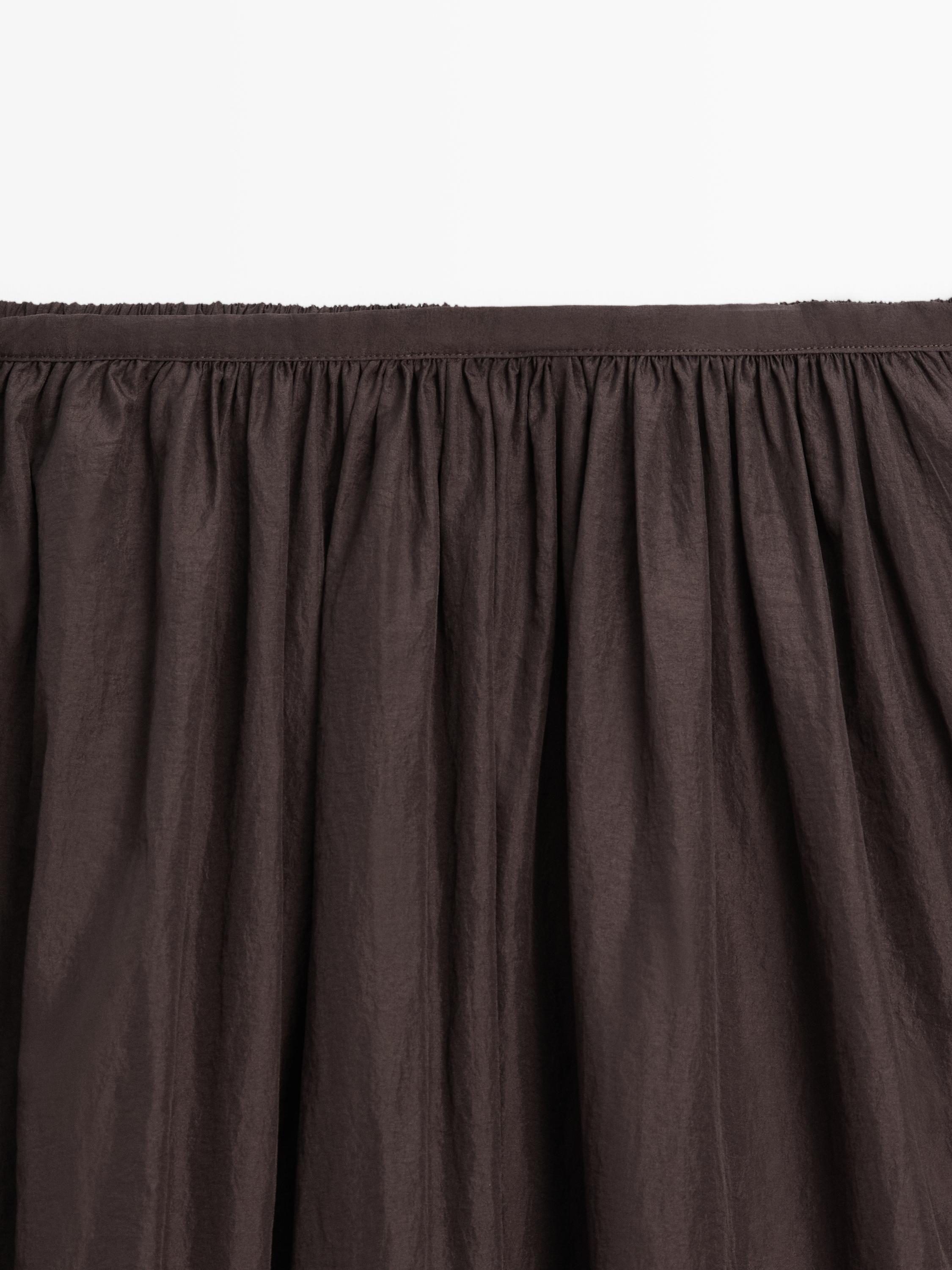 Long skirt with gathered detail